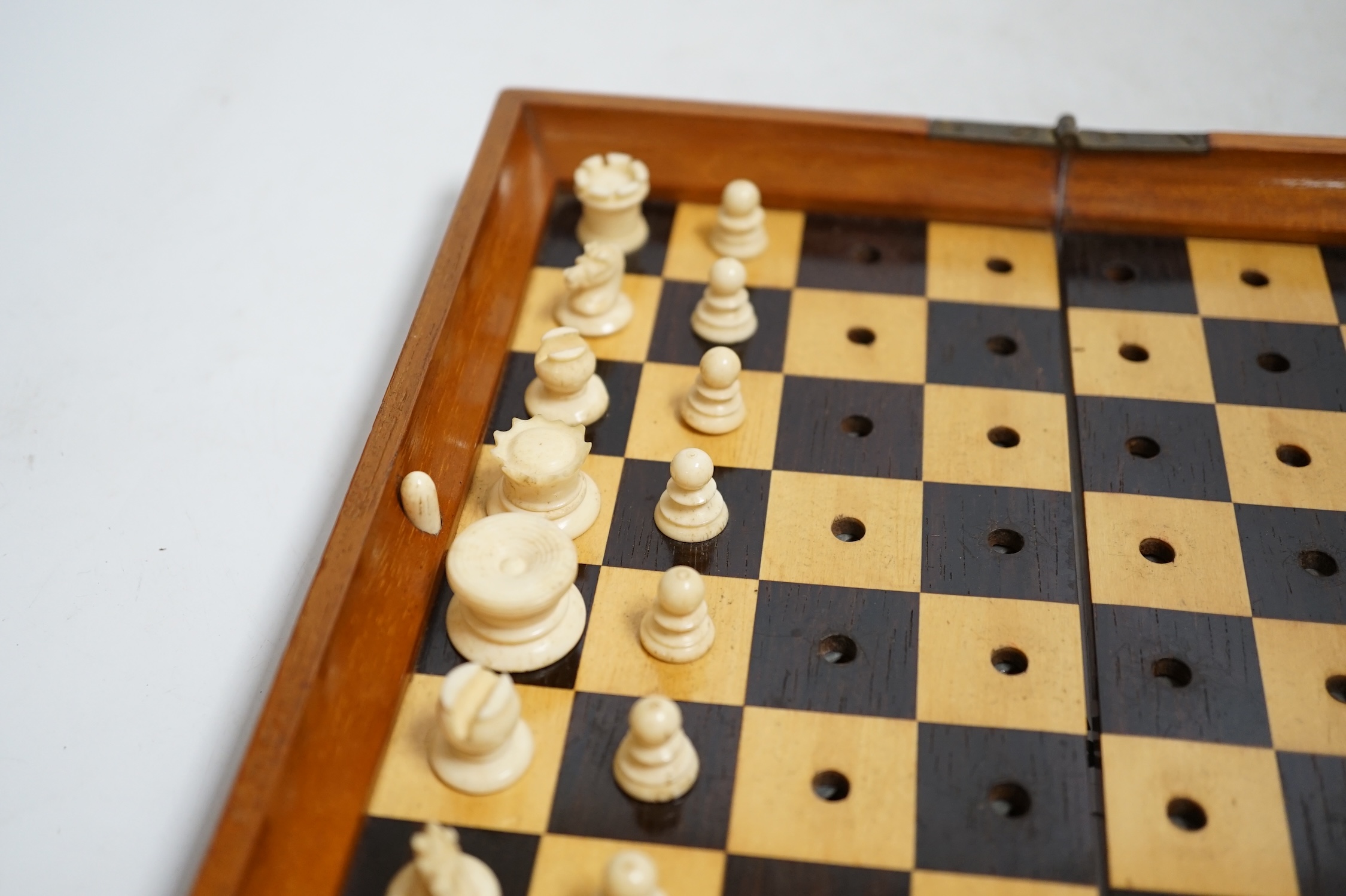 A Jaques in Statu Quo travelling chess set with bone pieces, leather slip case. Condition - fair
